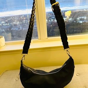 New/never used Zola crossbody bag. Vegan leather. Adjustable strap.